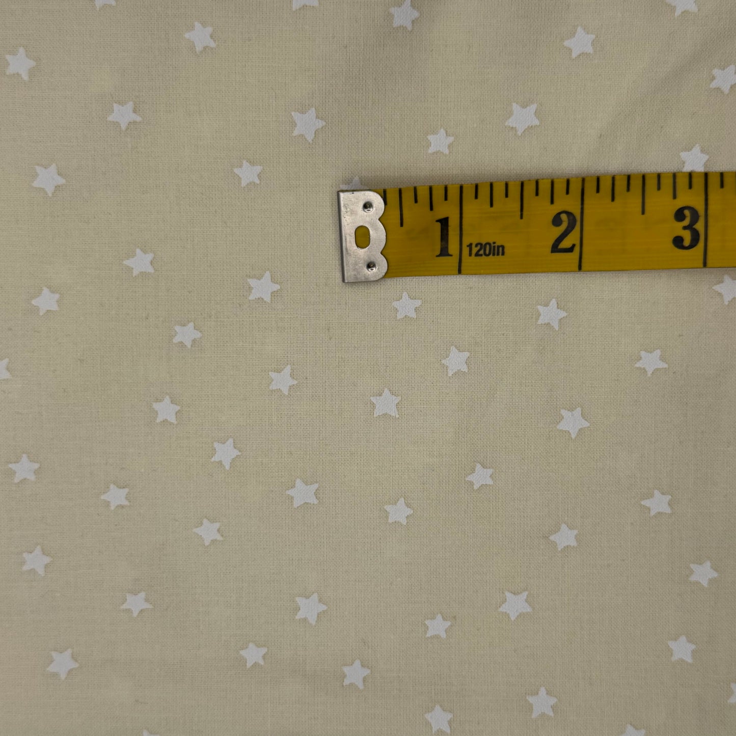 Cream With Stars Cotton: 1.5 yds