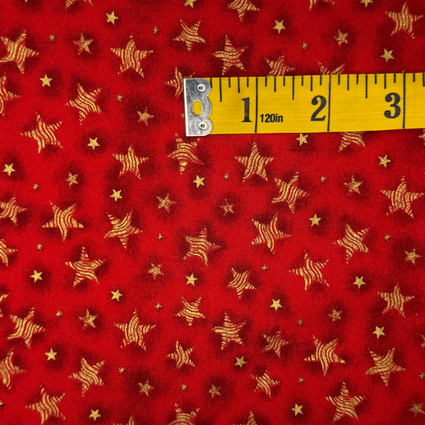 Red With Gold Stars Cotton: 1.5 yds