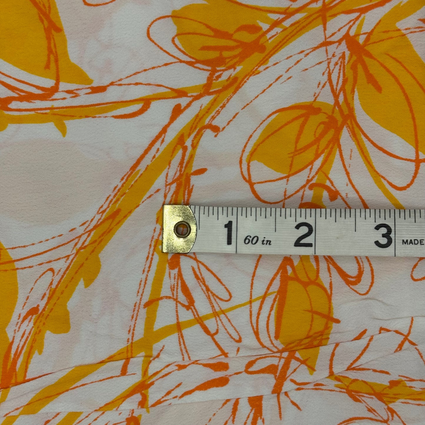 Yellow/Orange on White Abstract Print Crepe Poly: 1.75 yds