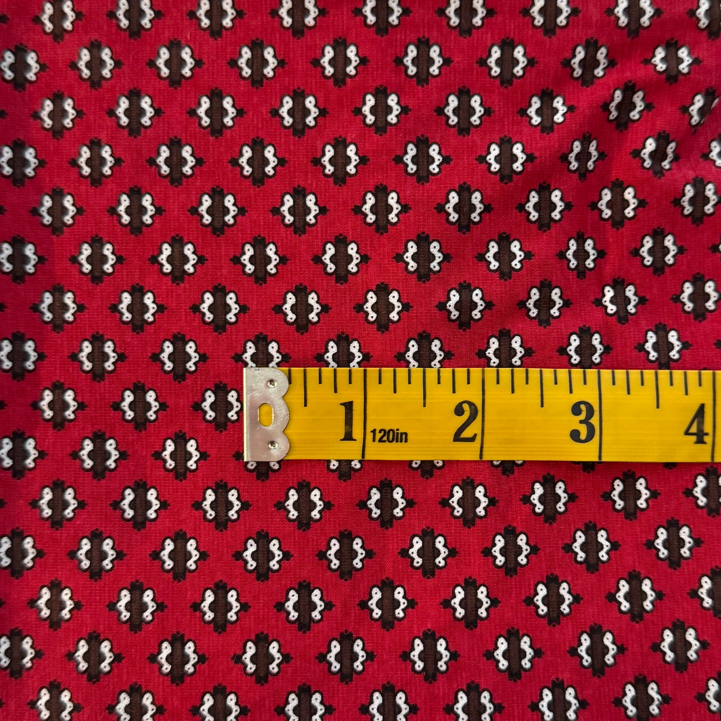 Red with Brown & White Embellishments Stretch Jersey Blend: 2.5 yds