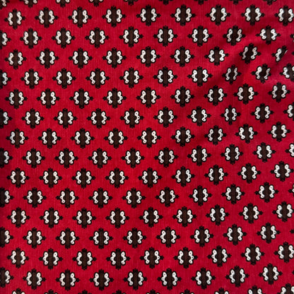 Red with Brown & White Embellishments Stretch Jersey Blend: 2.5 yds
