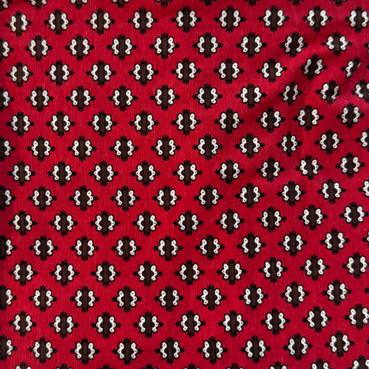 Red with Brown & White Embellishments Stretch Jersey Blend: 2.5 yds