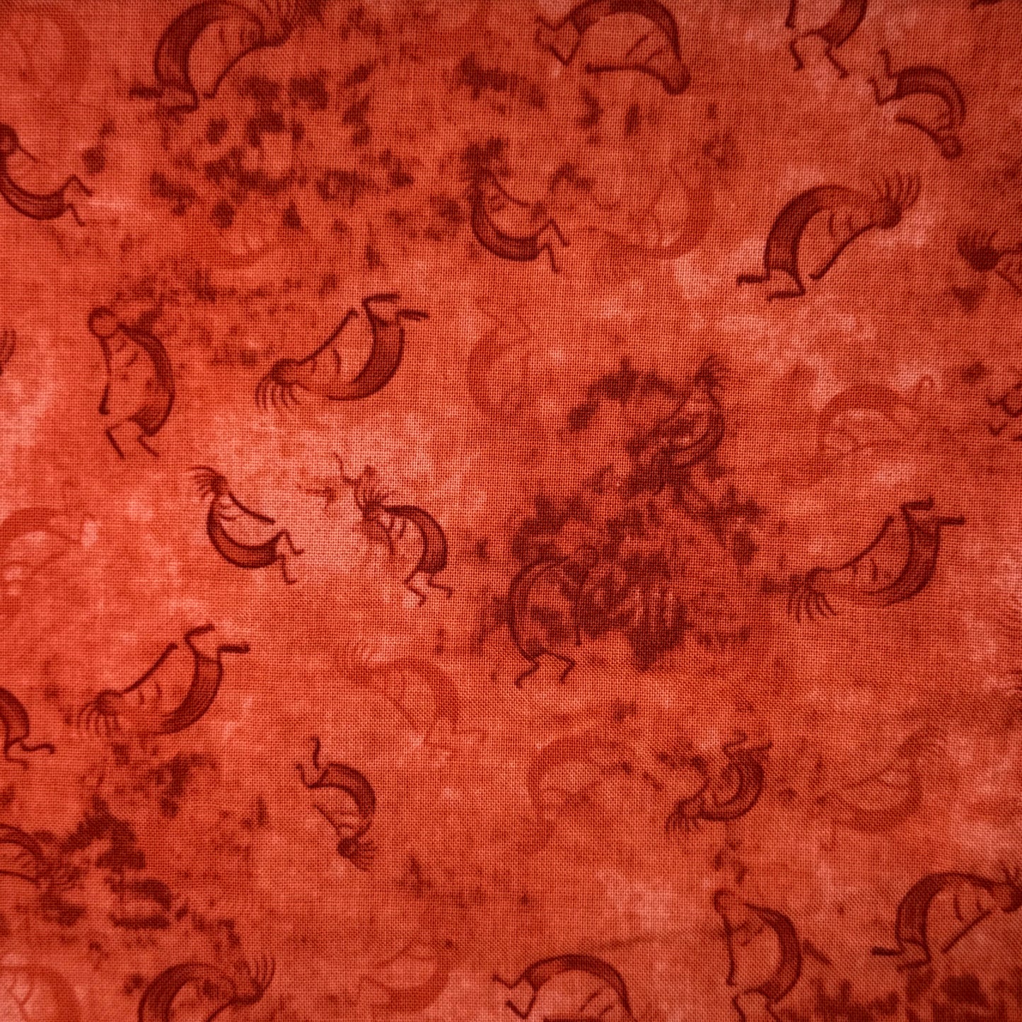 Red Tonal Kokopelli Cotton: 1.25 yds