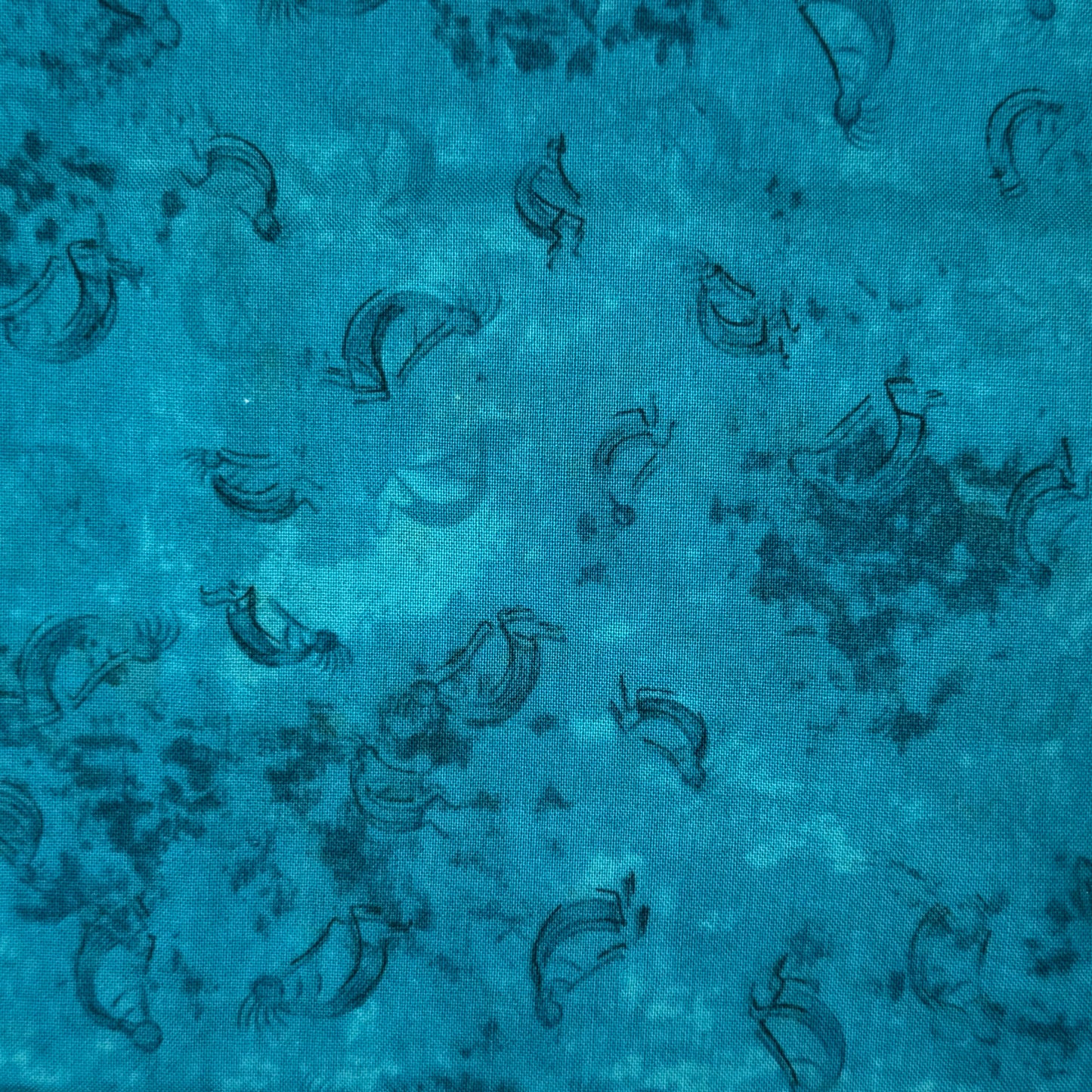 Aqua Tonal Kokopelli Cotton: 1 yd